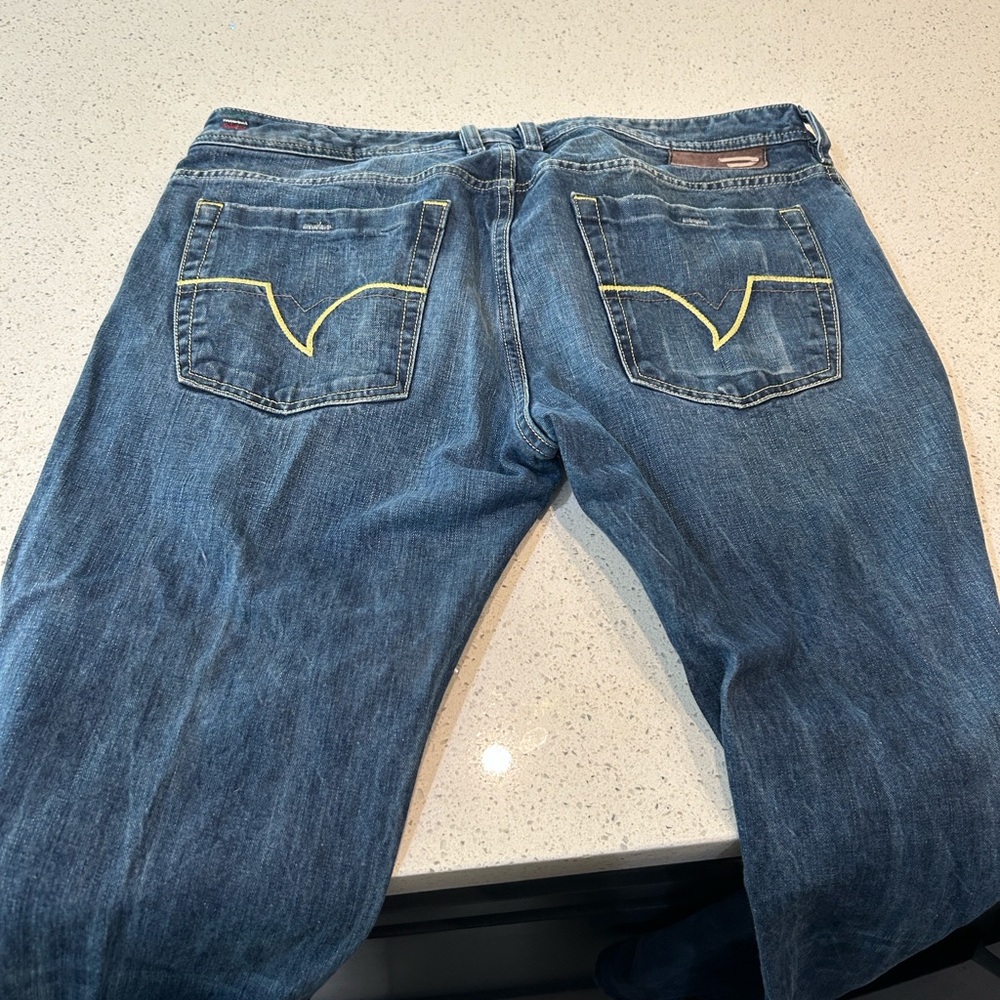 Diesel Relaxed Blue Jeans with Yellow Accents
